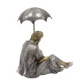 3---Figura-przedstawiajaca-siedzaca-pare.jpg